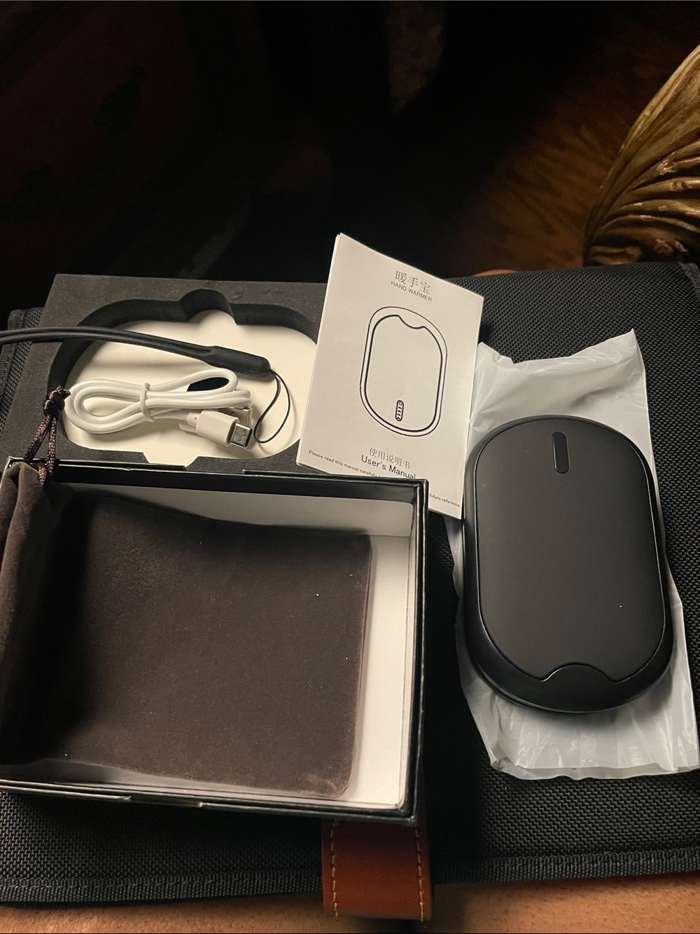 10000 mAh Rechargeable Hand Warmer/Power Bank-Black. New in box. Works 7-15 hrs.